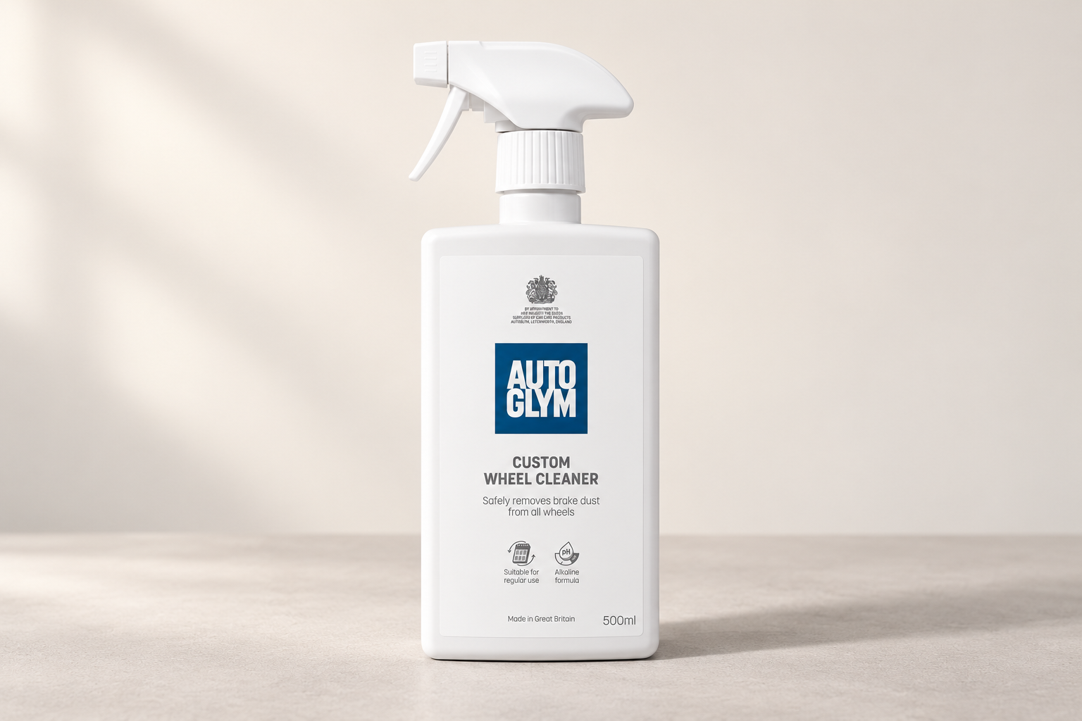 Autoglym Custom Wheel Cleaner in its labelled bottle on a neutral surface