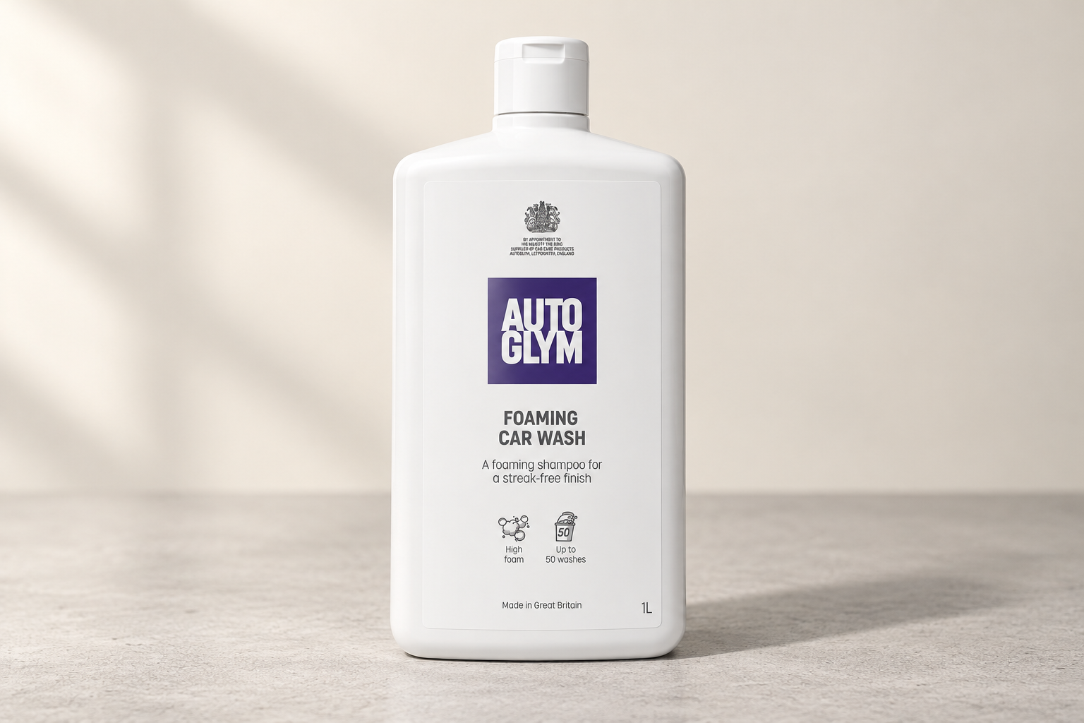 Autoglym Foaming Car Wash in its labelled bottle on a neutral surface