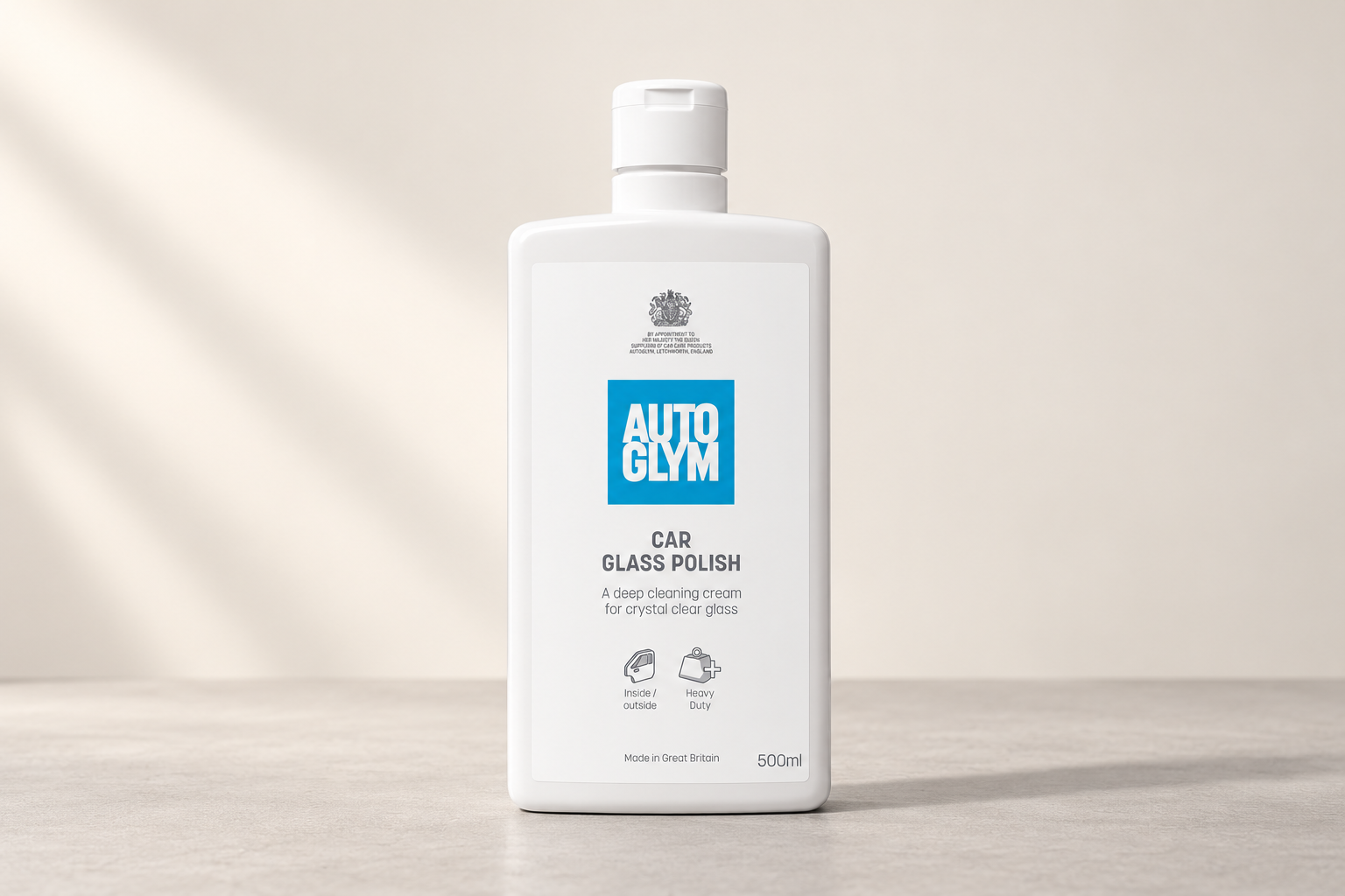 Autoglym Car Glass Polish in its labelled bottle on a neutral surface