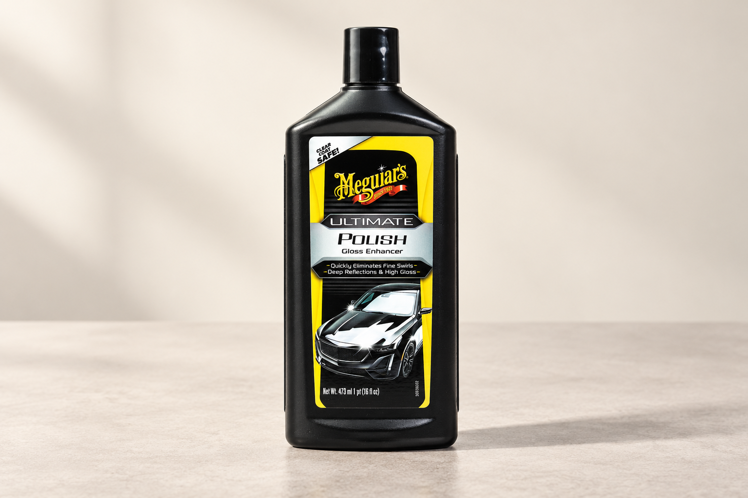 Meguiar’s Ultimate Polish in its labelled bottle on a neutral surface